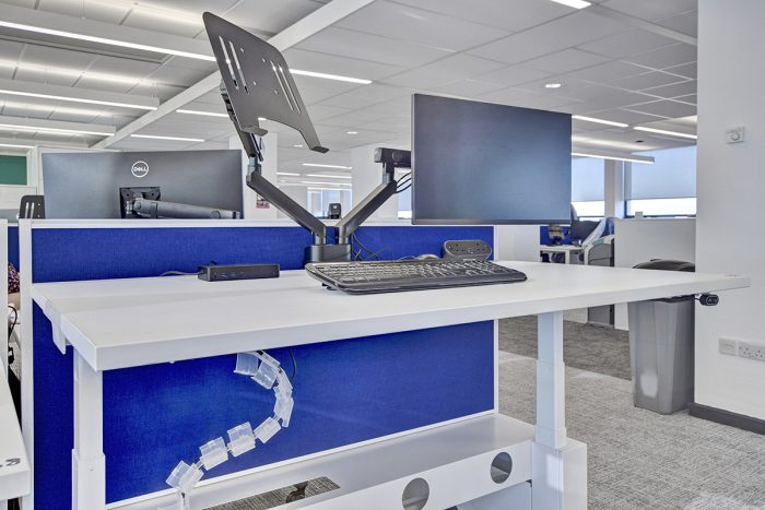 Height adjustable office desk with screen partitioning